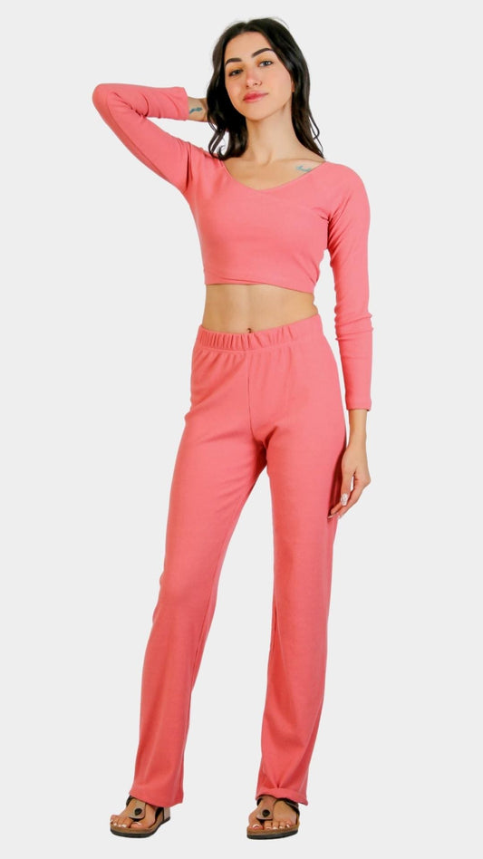Pink pajama set with long sleeve crop-top and pants